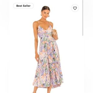 Worn once for a wedding! Size medium. Has been dry cleaner. Perfect condition!